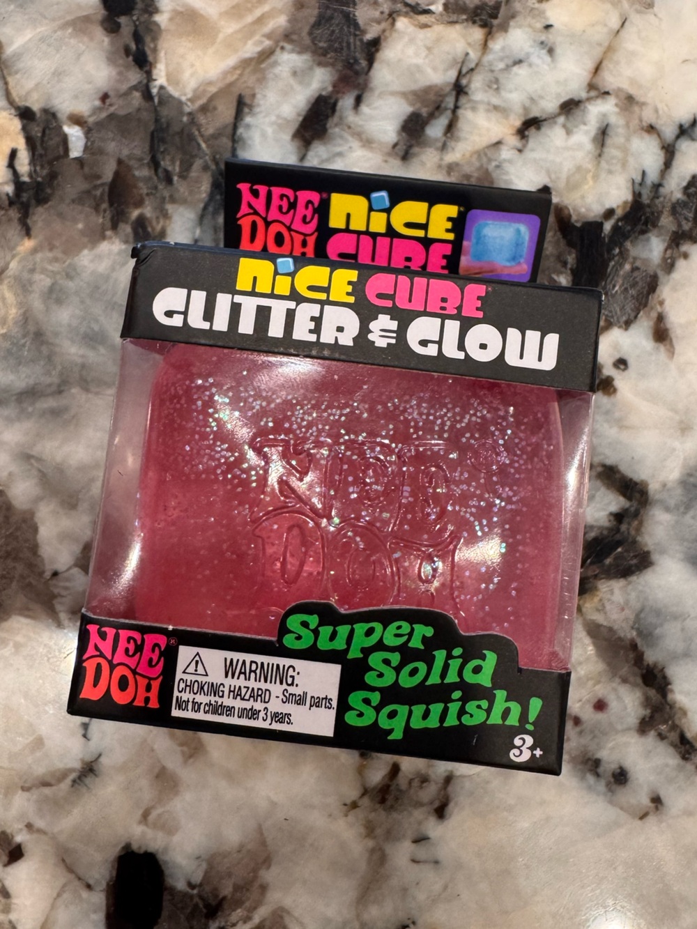 NeeDoh Nice Cube Glitter and Glow. Super Solid Squish! Glitter Pink Cube